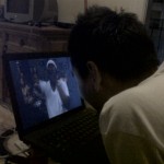 Me showing Woo a video of Supernatural, the best freestyle rapper on the planet